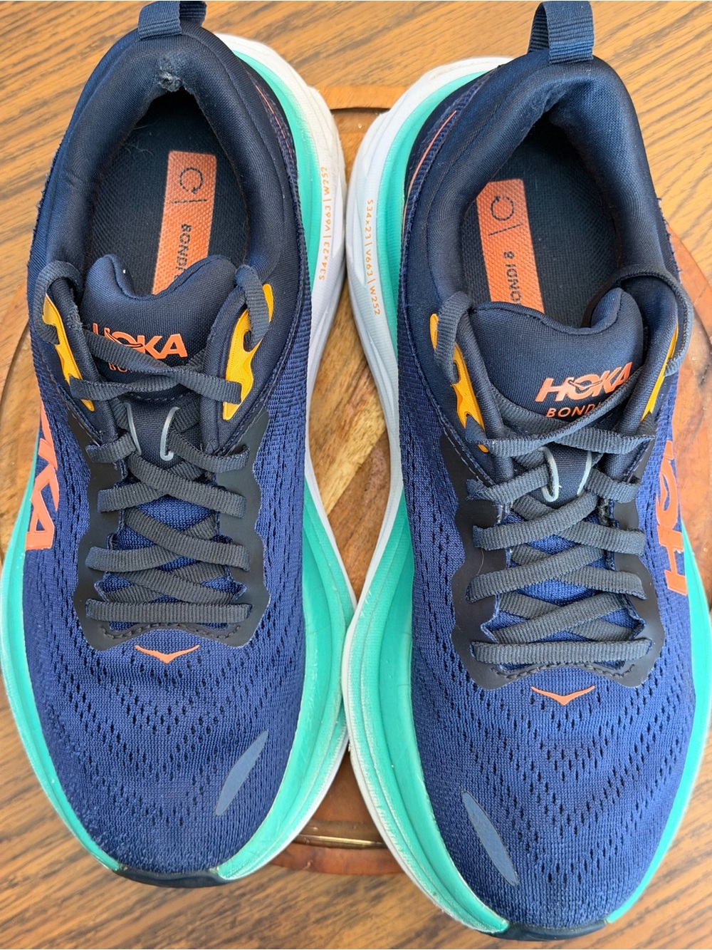 Hoka Navy Running Shoes with Teal Midsole and Orange Logo - Picture 4 of 9